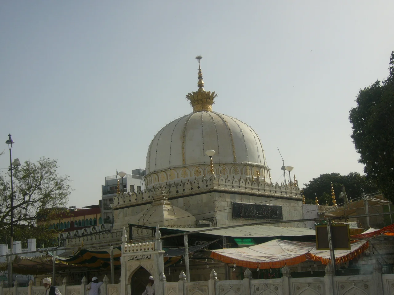 The white dome of Ajmer Sharif Dargah viewed from the courtyard in Ajmer