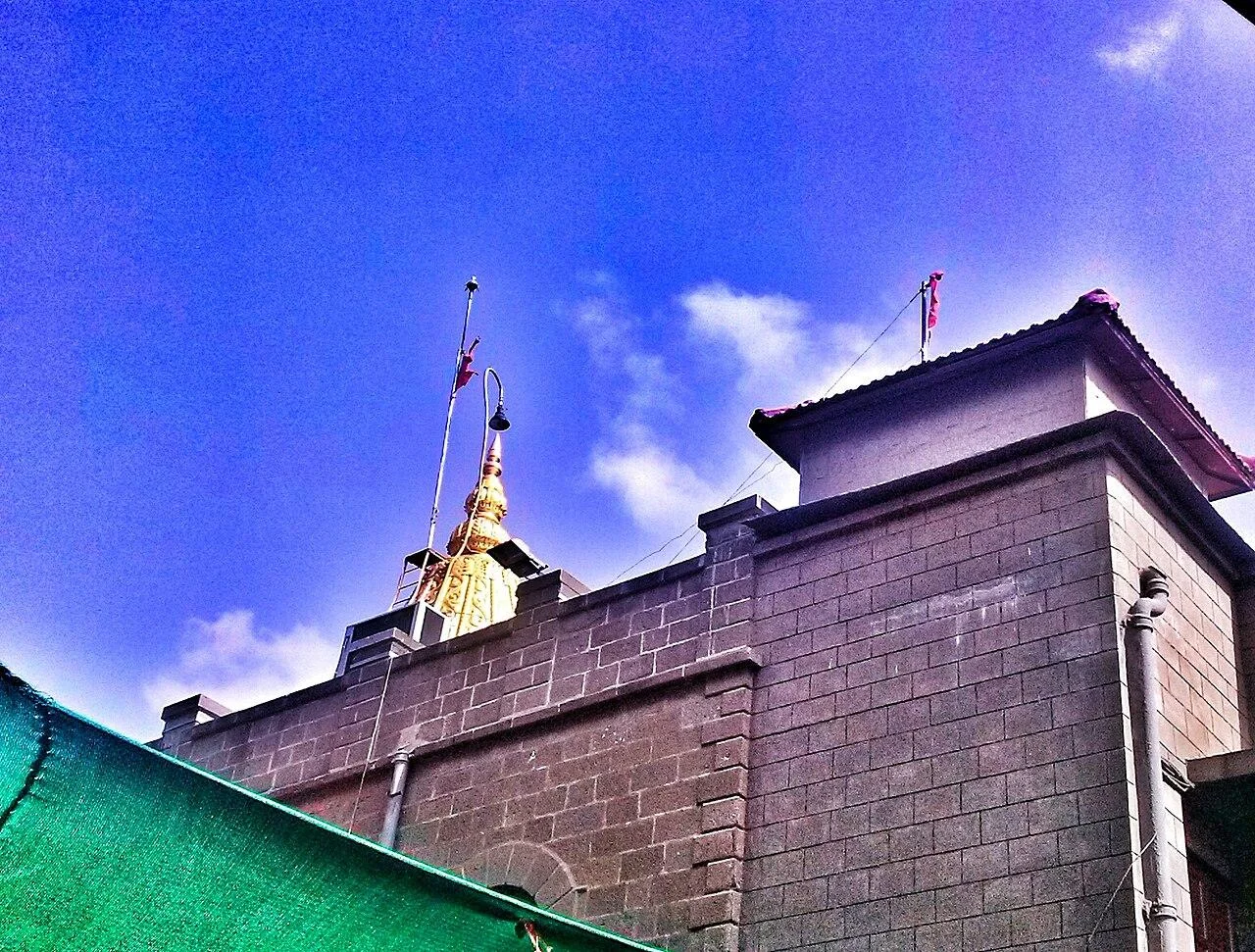 Golden spires above the wall of Sai Baba Samadhi Mandir in Shirdi